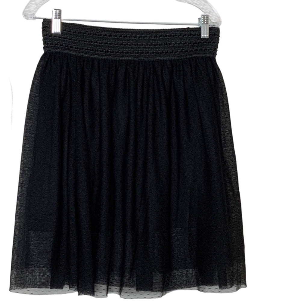 Bcx black mini skirt. Full shape with elastic waistband. Size L
